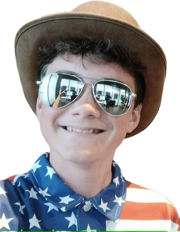 Henry in sunglasses and a cowboy hat